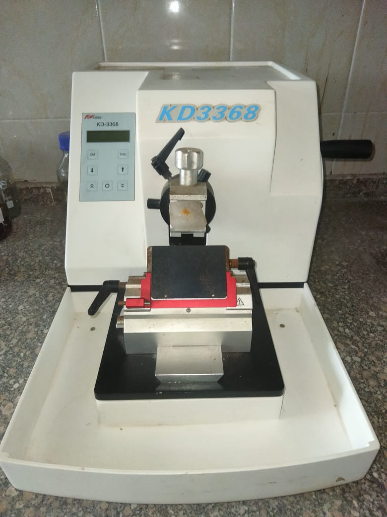 Microtome + automated paraffin dispenser